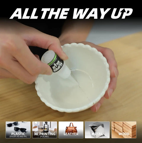 Person using All Purpose Super Glue For Plastic, Wood, Leather, Jewelry And Paper, 2610 PSI bond in seconds on a ceramic bowl