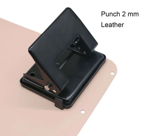 Two Hole Paper And Leather Puncher For Office And Home Use One Quarter Inch Circle Holes With Three Point One Four Inch Spacing A True Workhorse For Punching Twenty Sheets Or Two Millimeter Leather Black Mess Free Design shown punching leather