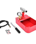 Front view of red 1000 PSI manual hydraulic test pump with gauge, brass fittings, and hose