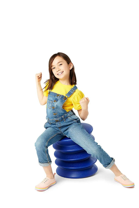 Active Sitting Stool for Kids Ergonomic Wiggle Friendly Desk Chair Designed to Boost Focus and Concentration with child sitting.
