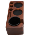 Portable Solid 58mm Stainless Steel Coffee Tamper Kit With Wooden Tamping Station showing wooden pad with storage compartments.