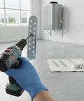 Person holding a drill with 4 Piece Outdoor Condenser Bracket Set With Screws Heavy Duty L Shaped Mounting Brackets visible in background