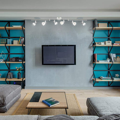 Six Light 4 Foot Chrome Integrated LED Track Lighting Kit With Assembly Required illuminating a modern living room setup.