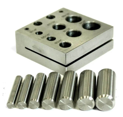 Heavy Duty Disc Cutter With Seven Jewelry Punches From One Quarter Inch To Five Eighths Inch shown on metal blocks