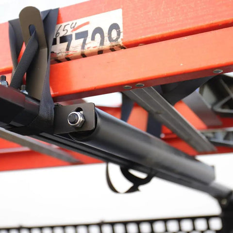 Built Tough 23.5 Inch Powder Coated Aluminum Ladder Roller With T Slot Compatibility For Roof Racks And Pickup Trucks, detail under rack.