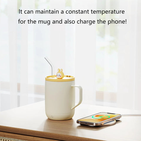 Cordless Smart Coffee Mug Warmer Plate With Digital Temperature Control Keeps Your Morning Brew Dialed In And Piping Hot Great For Office Desks Or Road Trips Say Goodbye To Sad Lukewarm Sips Always on a wooden table with a phone charging.