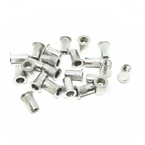 Get The Ultimate Flat Head Threaded Insert Kit With Assorted M3 To M10 Rivet Nuts For Auto, Furniture And Industrial Jobs Made From Durable Zinc Plated Aluminum That Resists Rust And Handles Heavy Loads Effortlessly, showing assorted zinc plated aluminum rivet nuts.