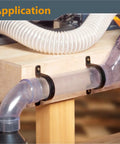 2-1/2 Inch Hose And Pipe Hangers 5 Pack Black For Wall Mounts keep dust hoses organized on wooden bench