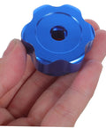 Hand holding Blue Round Wheel Handwheel Outdoor Faucet Handle Replacement For Hose Bib And Spigot Stem 6.6mm Hole Aluminum Alloy Valve Handle Kit