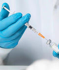 Bulk 30 Pack U100 Syringes 30 Gauge Five Sixteenth Inch 8 Millimeter 1 mL Disposable, Individually Wrapped, Pro Grade Performance, Smooth Leak-Proof Plunger, Clear Barrel, Medical Grade Single-Use Syringes in gloved hands with vial