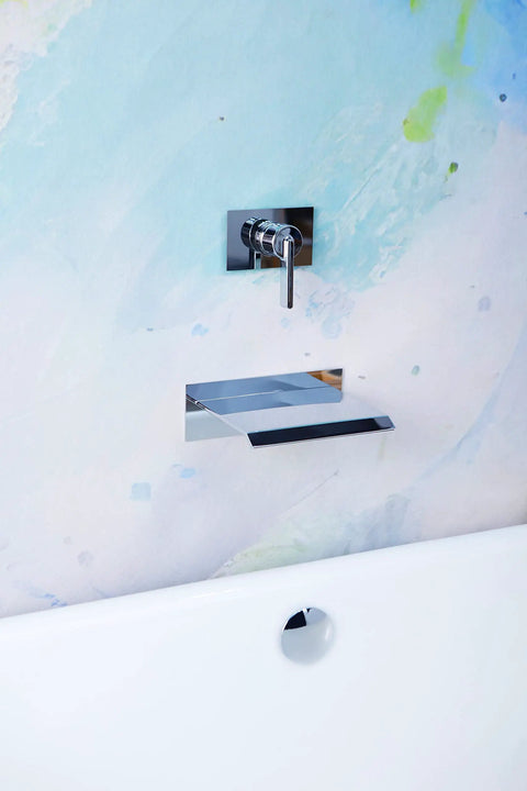 High Flow Wall Mount Tub Filler With Large Waterfall Spout And Single Lever Handle Pressure Balance Valve Included Chrome Finish cUPC Certified Delivers Spa Level Waterfall And Fast 8 GPM Fill in modern bathroom setting
