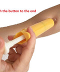 Go To Bee Sting And Snake Bite Venom Extractor Kit With Vacuum Suction Pump for first aid use shown on arm.