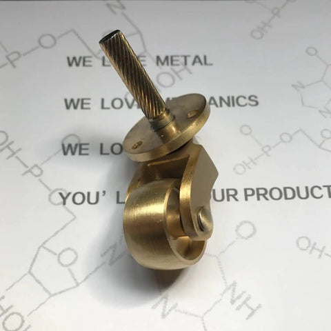 Retro Polished Brass Furniture Casters 25Millimeter Swivel Wheel Rollers For Kitchen Cupboards And Cabinets featuring a 25mm copper roller and screw mount.