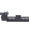 Heavy Duty Linear Slide Guide Rail 100mm Stage Actuator Boasting Aluminum Alloy Chassis And T6x4 Electric Motor, black chassis with wires.