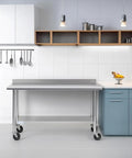 Stainless Steel Prep And Work Table 24 By 48 Inches With Caster Wheels NSF Certified Pro Grade Beefy Heavy Duty Undershelf And Backsplash For Restaurant Home And Hotel in a kitchen setting