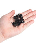 Top Tier Black Upholstery Tack Nail Pins Heavy Carbon Steel Furniture Repair Kit 50 Piece in hand, showcasing 17mm length black decorative tacks.