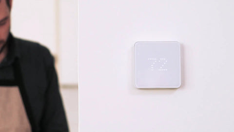 White ZigBee Edition Smart Thermostat on wall showing 72 degrees, easy comfort control, compatible with SmartThings SwannOne Securifi Almond hubs