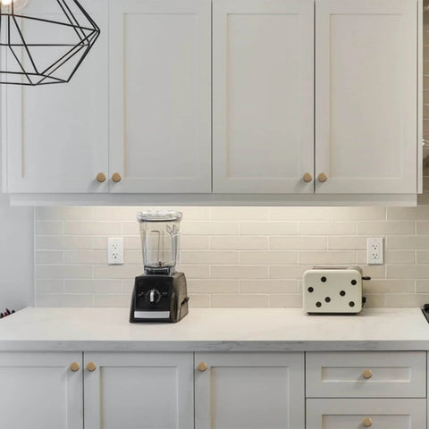 Matte Black And Champagne Bronze Kitchen Cabinet Knobs Set Of 10 For Dresser Drawers Zinc Knobs With Dope Durable Finish And Easy Install Modern Style Hardware For Cabinet Doors And Drawer Fronts. Installed on white kitchen cabinets.