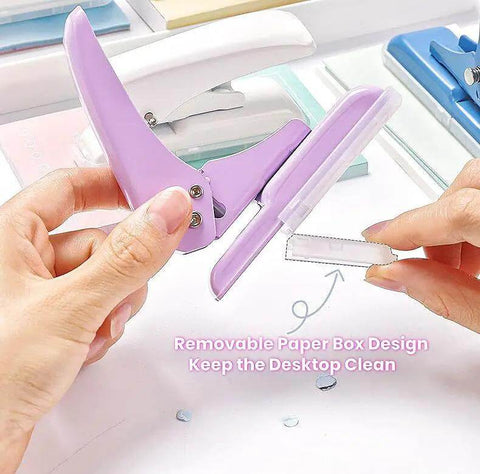 Hands holding Rugged Heavy Duty Single Hole Punch For Papers And Crafts 40 Sheets Capacity One Quarter Inch Purple Hole Puncher Built To Last Metal Construction Durable For Scrapbooks Cards And Tags