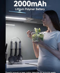 Rechargeable Under Cabinet Lights With 40 LEDs, Wireless Motion Sensor illuminating a kitchen counter at night 2 Pack