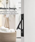 Two Pack Recessed Pocket Door Edge Pull Handles In Matte Black installed on white sliding door with modern design backdrop.