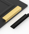 Top Shelf 10 Pack Of Matte Black Finger Edge Pulls With Five Inch Center Spacing And Smooth Rounded Corners perfect for kitchen cabinets shown with gold pull.