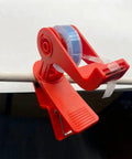 Versatile Adjustable Tape Dispenser With Precision Ribbon Cutter And Tough Locking Clip For Boss Mode Desk Organization and daily project fixes, red, mounted.