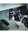 Worker using 12V Max EC Brushless 3/8 Inch Drill Driver Kit With Ultra Lightweight 1.6 Lb Tool in tight overhead space