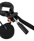 Killer Heavy Duty Strap Clamps For Woodworking Projects Badass Corner Bands With Four Locking Jaws For Picture Frames Drawers And DIY Project Builds. Image of adjustable black strap clamp with locking jaws and canvas strap.