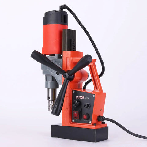 Powerful 1280W Portable Magnetic Drill Press With Super Strong Electromagnet For Heavy Duty Metal Drilling Tasks Up To 1 Point 38 Inch Core Diameter And 660 RPM Speed For Industrial Job Sites, showing the drill's control panel and magnetic base.