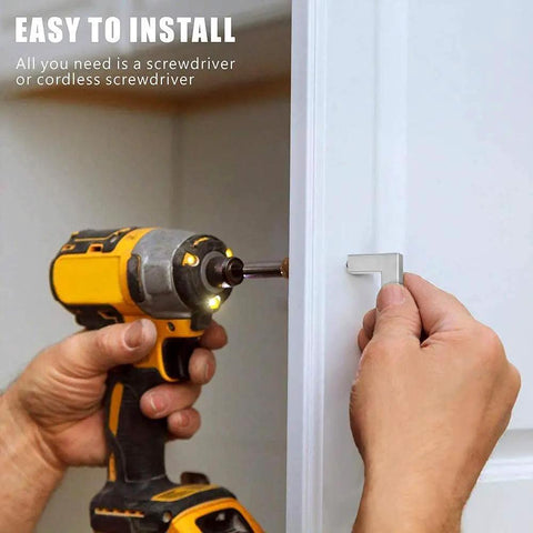 Installing Top Shelf Slick Brushed Nickel Cabinet Pulls And Drawer Handles with a cordless screwdriver.