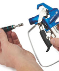 Installing Contractor PC ProConnect Replacement Cartridge Blue 17Y297 into paint spray gun.