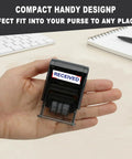 Premium Self Inking Date Stamp With Blue And Red Ink Perfect For Received Docs held in hand, compact design for easy use.