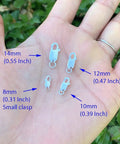 Hand holding four different sizes of sterling silver lobster trigger clasps with measurements, including 14mm and 12mm sizes.