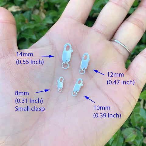Hand holding four different sizes of sterling silver lobster trigger clasps with measurements, including 14mm and 12mm sizes.