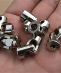 Metal Cardan Joint Gimbal Coupling Shaft For Motor Connector Universal Joint Model Part Fits 2.3-3mm Hole Size in hand.