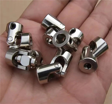 Metal Cardan Joint Gimbal Coupling Shaft For Motor Connector Universal Joint Model Part Fits 2.3-3mm Hole Size in hand.