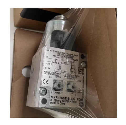 Electric proportional valve, silver metal body; side view with wiring diagram label showing 24V DC and 0–10V, two terminals
