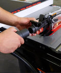 Pro Grade Dust Collection Blade Guard Assembly for Table Saws being installed, showing independent lateral guards and hose connection
