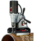 Tough As Nails Magnetic Drilling Machine With Zero Cord Magnet Base For Flat And Curved Steel Sheet Metals Quick Release Feature No Sweat Shop Ready Mag Drill Tool on curved steel pipe.