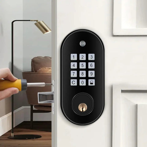 Slick Keyless Entry Deadbolt With Numeric Keypad mounted on a door with a hand using a screwdriver for installation.