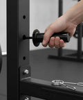 Heavy Duty Weight Stack Pin For Home Gym Selector fits smoothly into strength machines, held by a hand, 150mm black metal design.