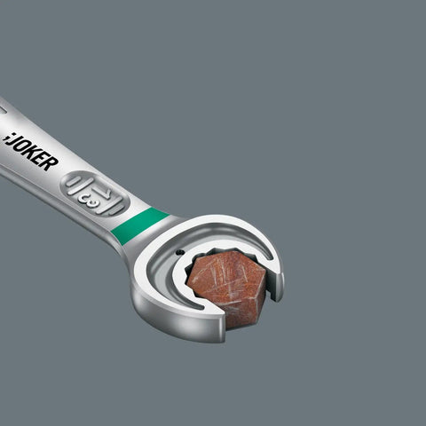 Close-up of Joker Ratcheting Combination Wrench showing holding jaw with a hex bolt, highlighting double hex design for grip.