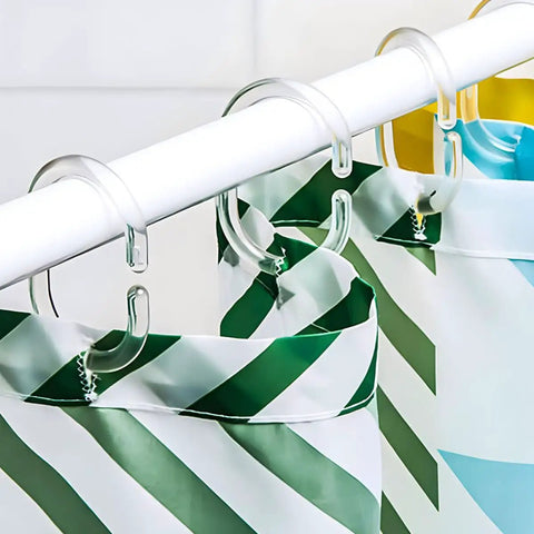 Close-up of 48 Pack Plastic Shower Curtain Hooks for Bathroom Rods, Smooth Glide Curtain Hangers in use on a rod with curtains.