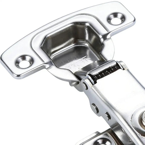 Close-up of concealed stainless steel cabinet hinge with quiet soft close, showing overlay style for kitchen, bath, and more.