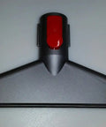V8 Cordless Vacuum Tool Kit mattress attachment, shown in close-up against a plain background for efficient upholstery cleaning.