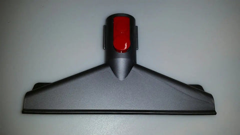 V8 Cordless Vacuum Tool Kit mattress attachment, shown in close-up against a plain background for efficient upholstery cleaning.