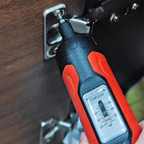 Premium 1/4 Inch Drive Preset Torque Screwdriver Set Adjustable 10-65 In-Lbs Click being used on a screw for precision repairs.