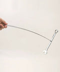 Telescoping Magnetic Pickup Tool Kit For Woodturning Projects in use holding a metal wrench, hardware parts only visible.
