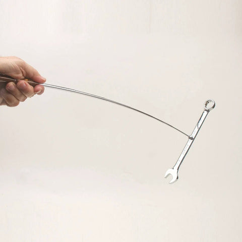 Telescoping Magnetic Pickup Tool Kit For Woodturning Projects in use holding a metal wrench, hardware parts only visible.